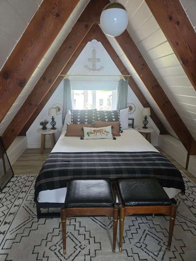 Bedroom under exposed wood beams