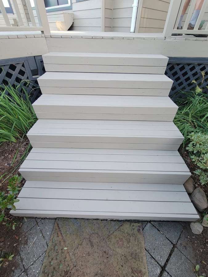 New deck stairs leading down to the garden