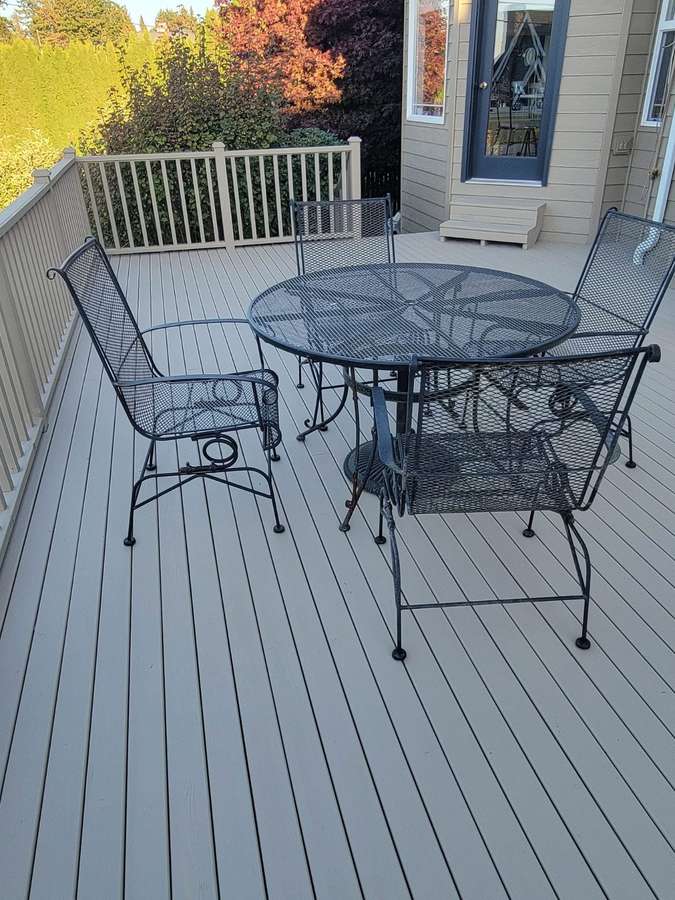 Patio table and chairs on the new deck