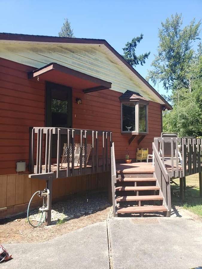 New exterior stairs and railings at a back door