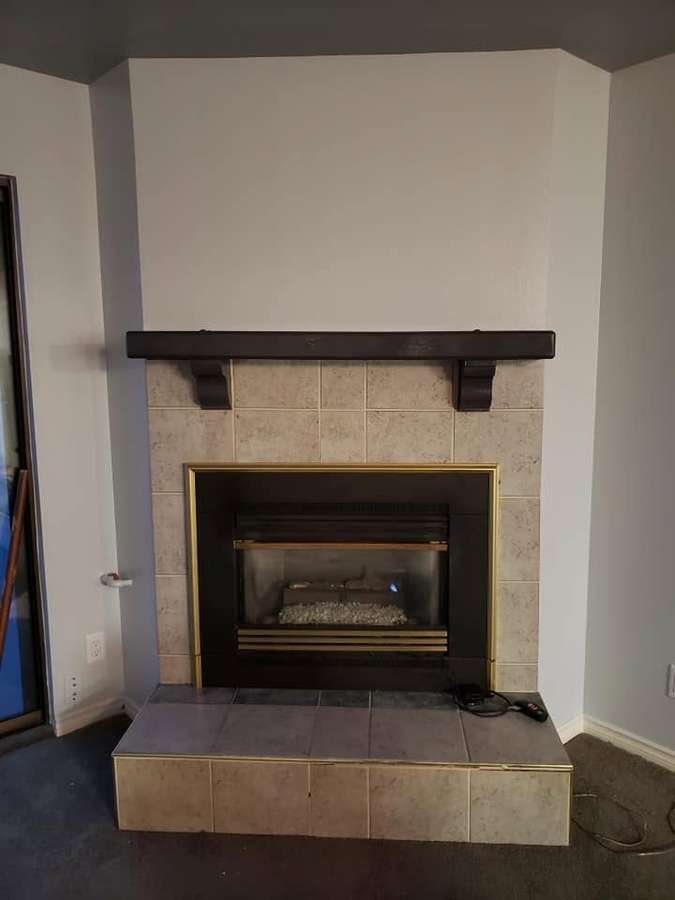 Fireplace with a new surround and mantel
