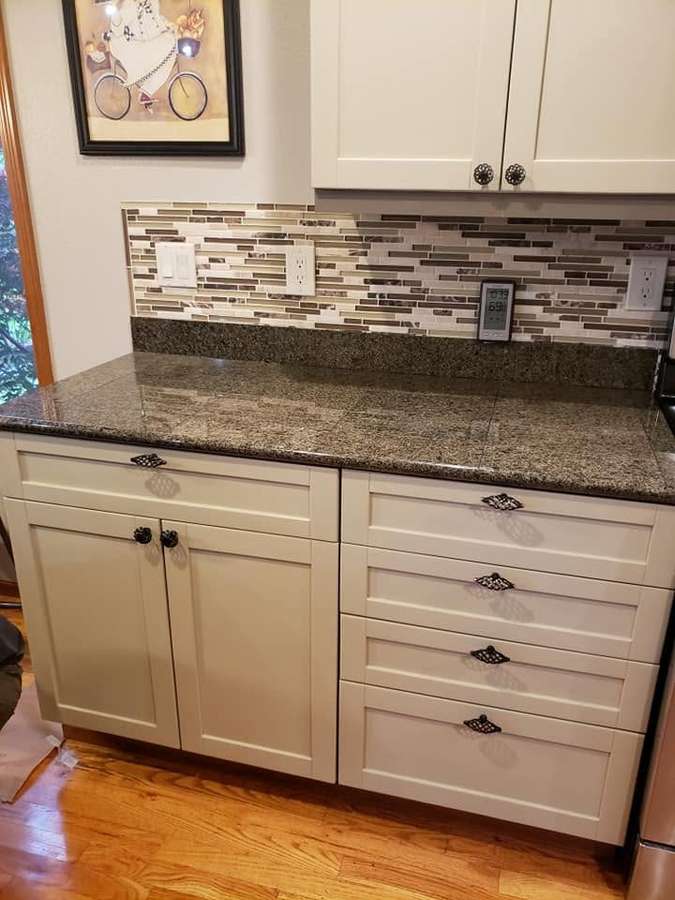 New countertop with a mosaic tile backsplash